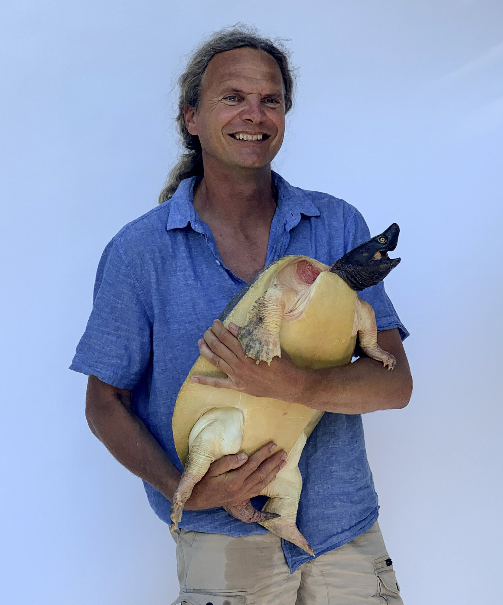 Turtle Island founder Peter Praschag with a giant softshell turtle